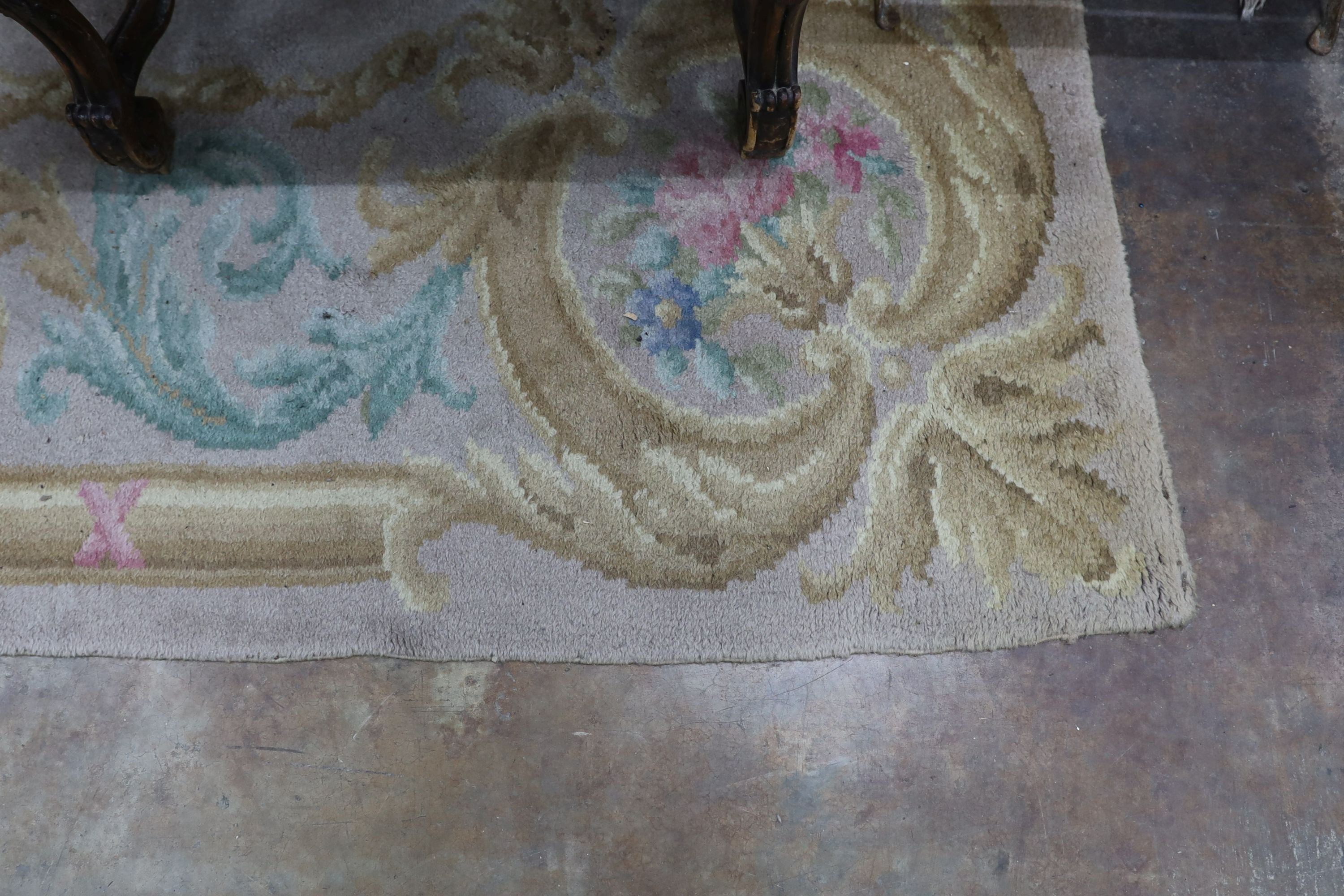 An Aubusson style fawn ground wool carpet, 360 x 260cm
